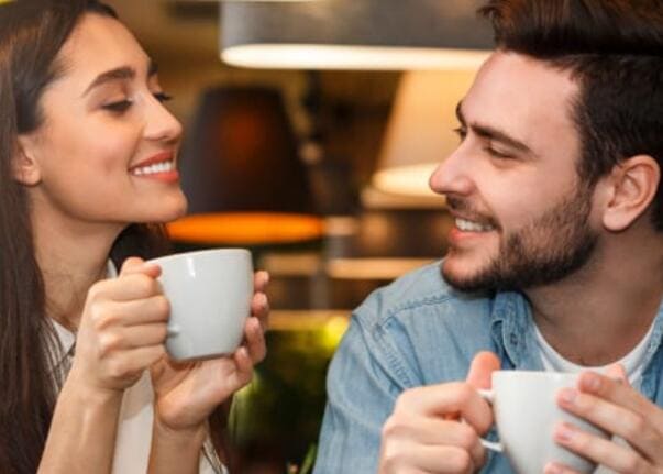 Adult couple enjoying a relaxed city conversation
